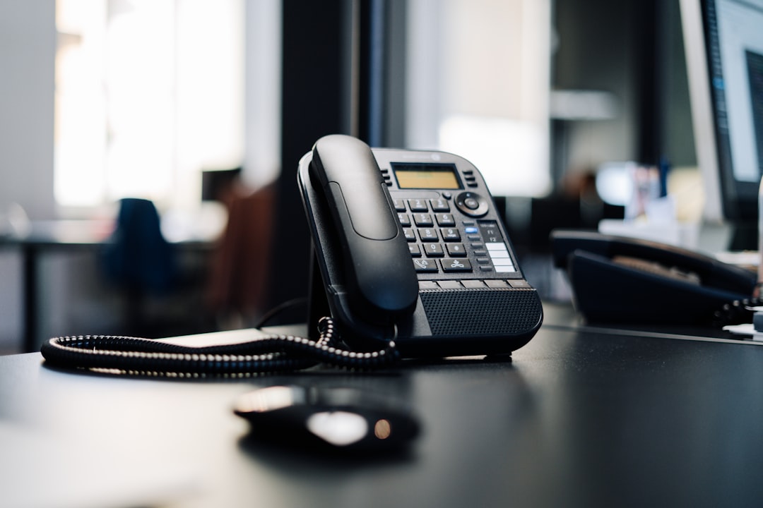 A business desk telephone handset